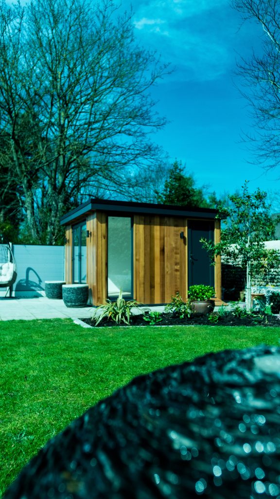 Lytham Exteriors 1-03 shot of garden room from across the garden