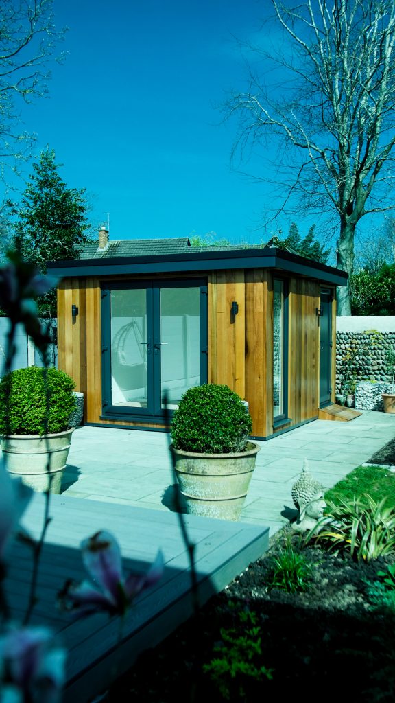 Lytham Exteriors 1-07 shot of garden room from bushes