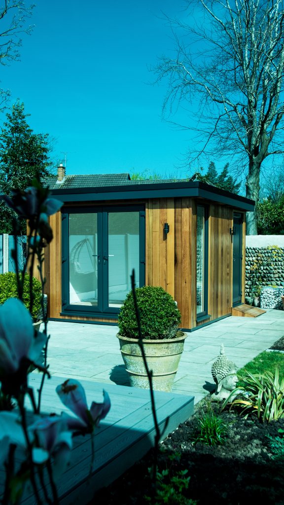 Lytham Exteriors 1-09 shot of garden room from bushes