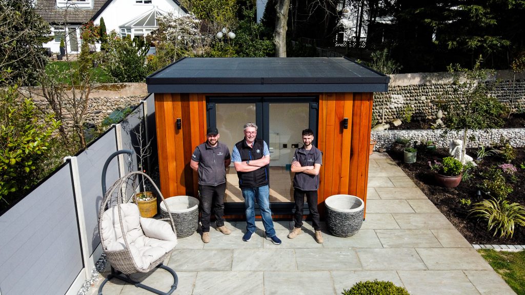 Lytham Exteriors 1-19 two workers and customer stood infront of garden room