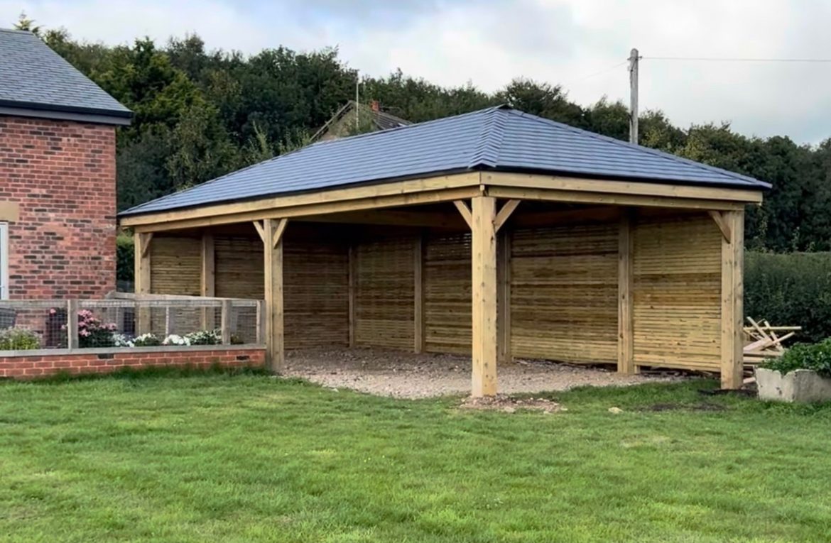 Bespoke timber gazebo in a large garden